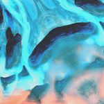 photo by ravjot singh Stunning abstract art featuring dynamic blue and coral colors with fluid patterns.